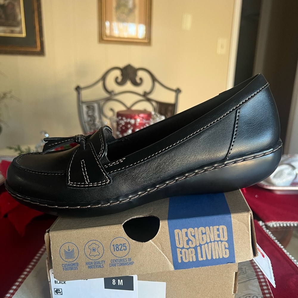 Clarks Black Leather Flats with Stitch Detail